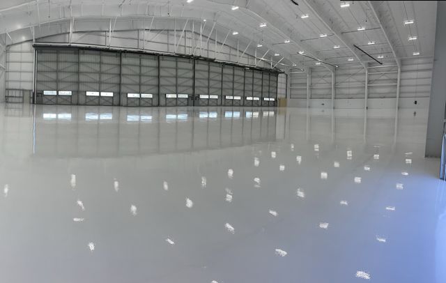 Finished glossy floor in an aircraft hangar