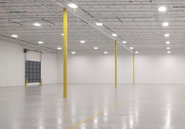 Finished epoxy broadcast flooring system at Milgard manufacturing facility